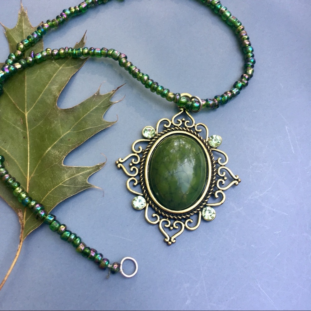 Vintage Green pendant on green glass beads